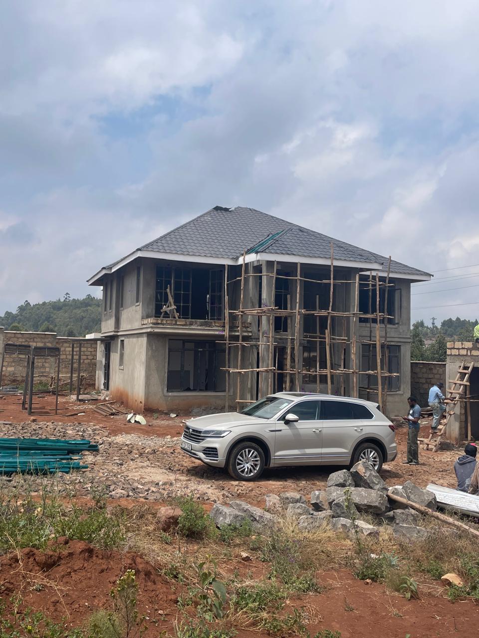 Cedar Homes maisonette under construction with roofing complete and scaffolding in place, September 2026